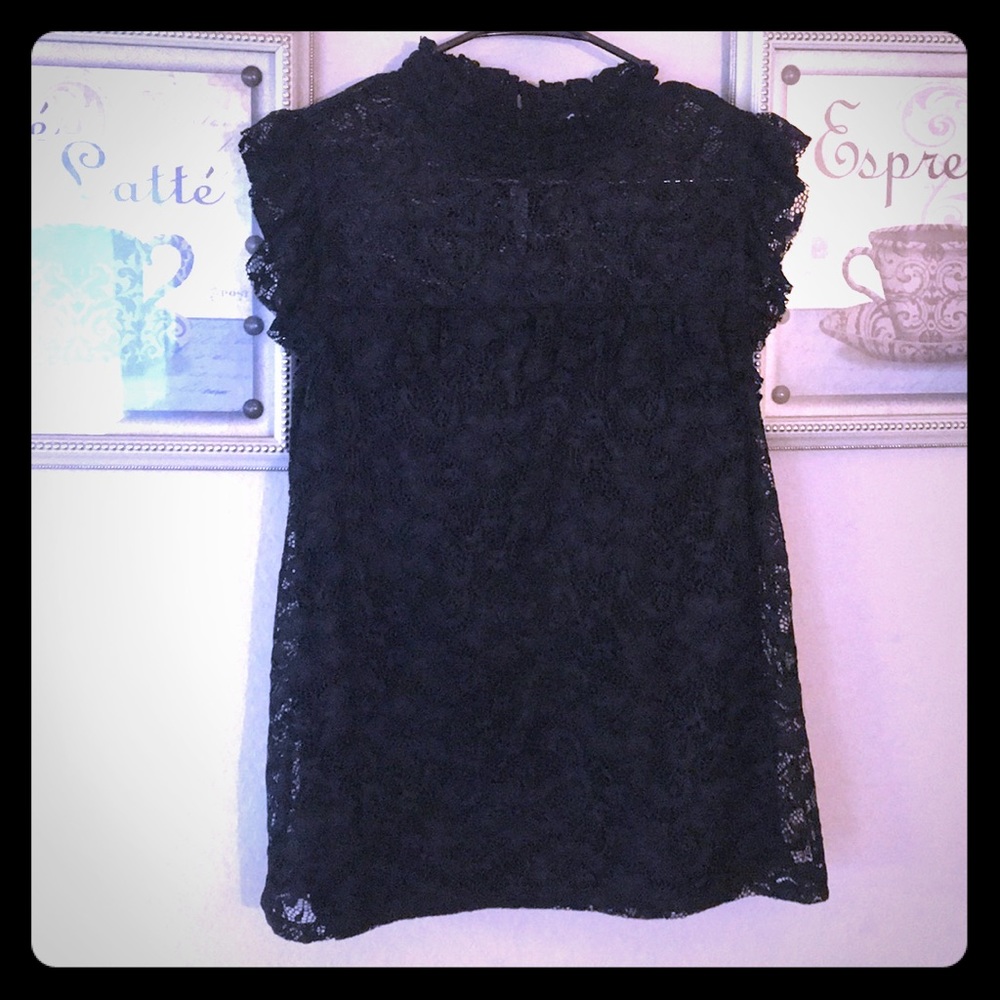 2 for $20. Beautiful brocade blouse no sleeves !